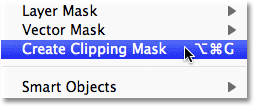 Chọn lệnh Create Clipping Mask từ menu Layer trong Photoshop. Hình ảnh © 2011 Photoshop Essentials.com.